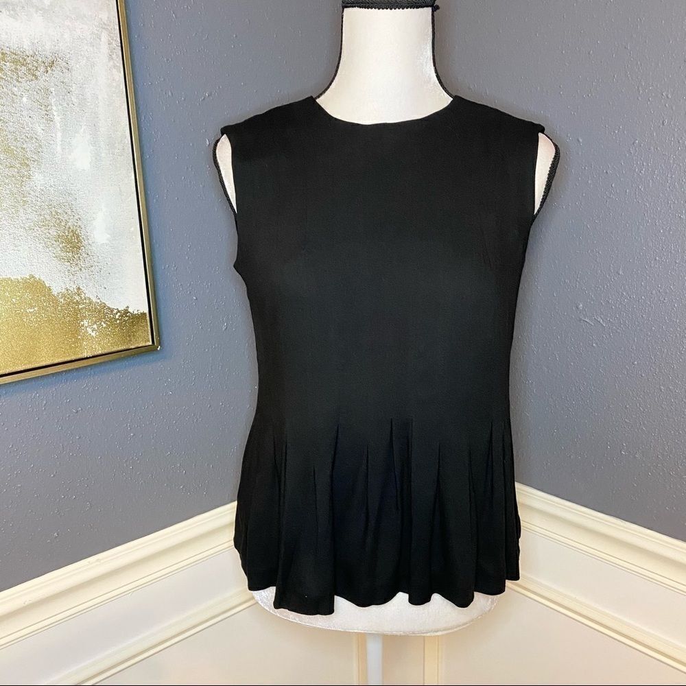 Med Winds peplum button back sleeveless blouse